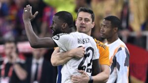 Real Madrid defender Antonio Rudiger is restrained as he shouts at the referee during the Copa del Rey final against Barcelona, Seville, Spain, April 26, 2025. (AA Photo)