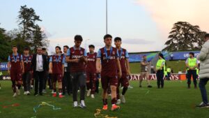 Trabzonspor under-19 players look dejected after losing the UEFA Youth League final to Barcelona at the Centre Sportif de Colovray, Nyon, Switzerland, April 28, 2025. (AA Photo)